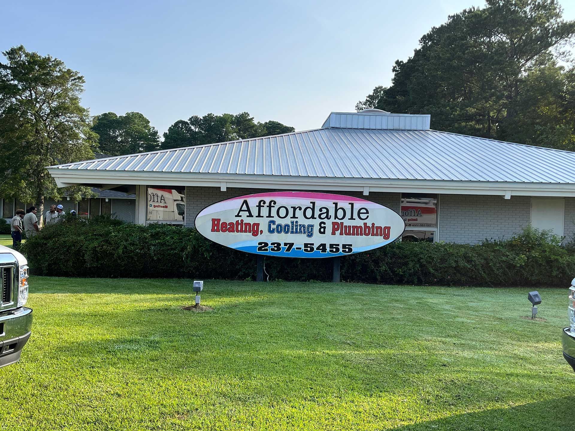 store exterior with van 26