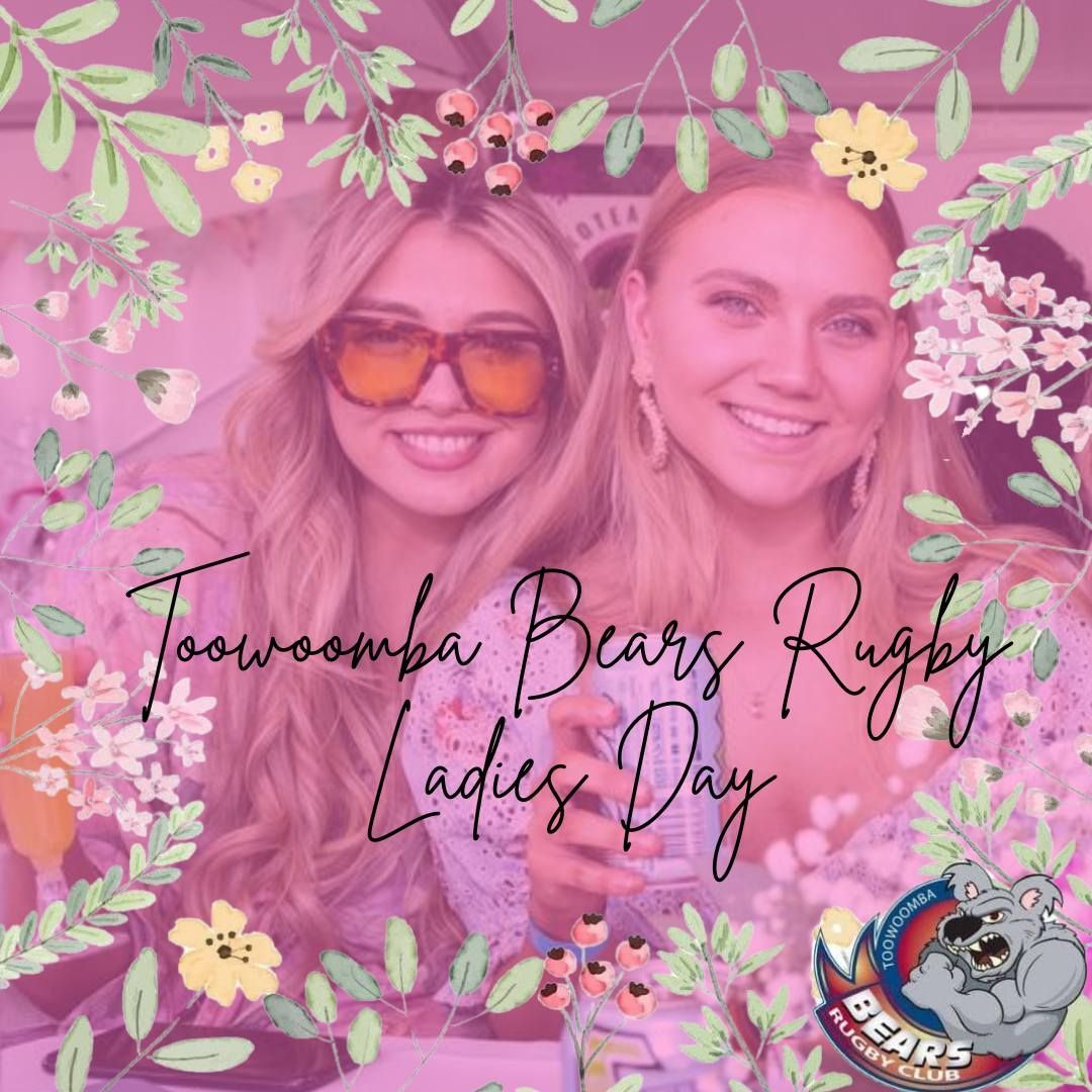 Two women wearing sunglasses are standing next to each other on a pink background.