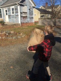 Child Walking With Food Packet