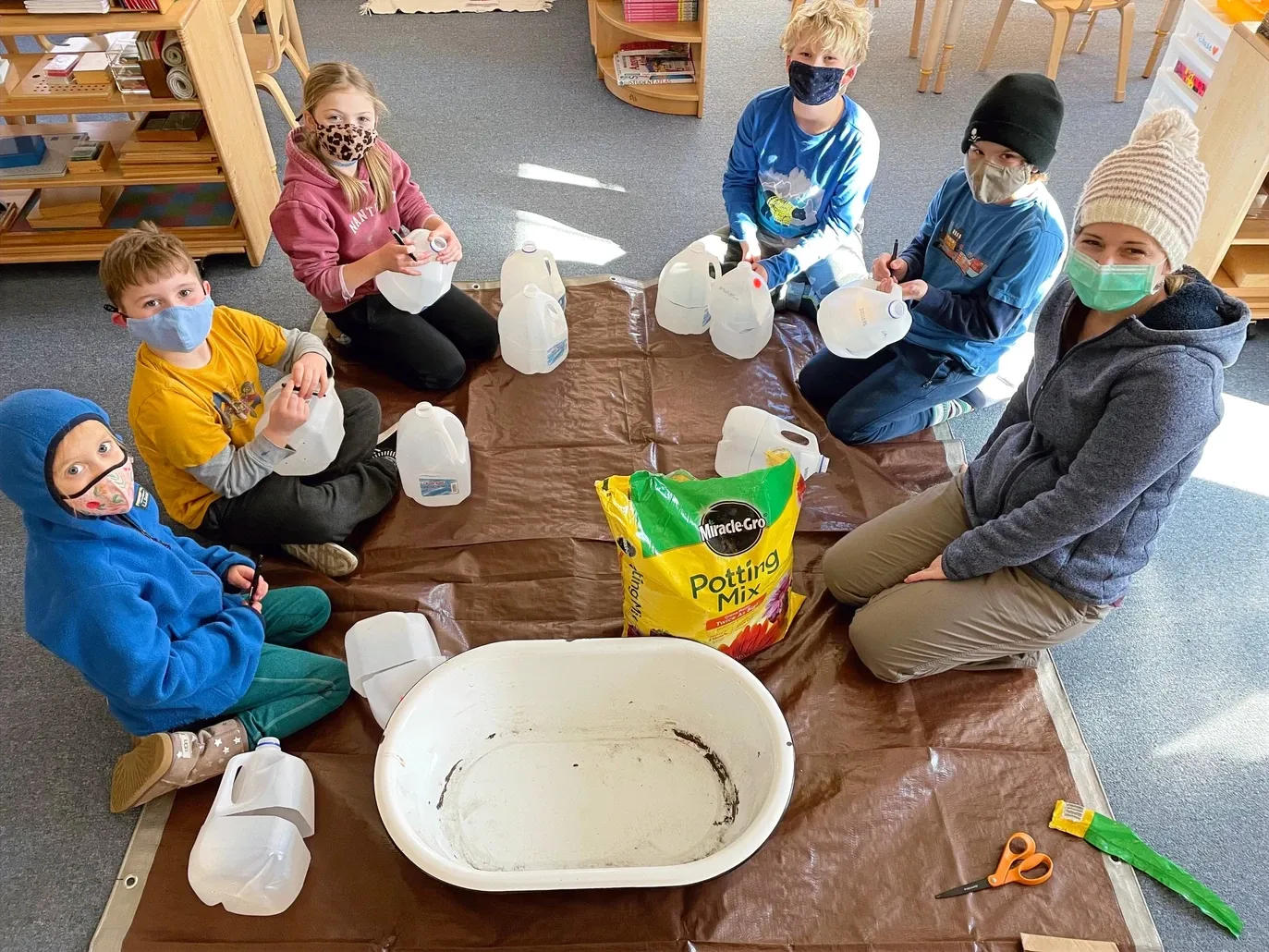 Children Plant Seeds clicking Photo