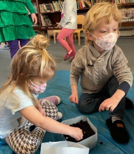 Children Plant Seeds