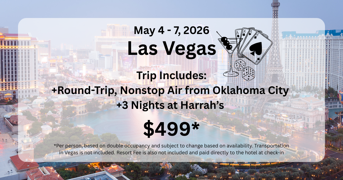 A castle sits on top of a cliff overlooking the ocean