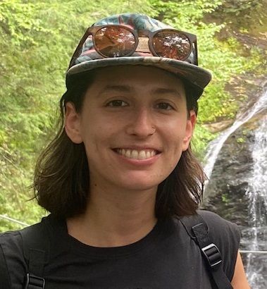 Photo of Rachel Swanwick in the forest
