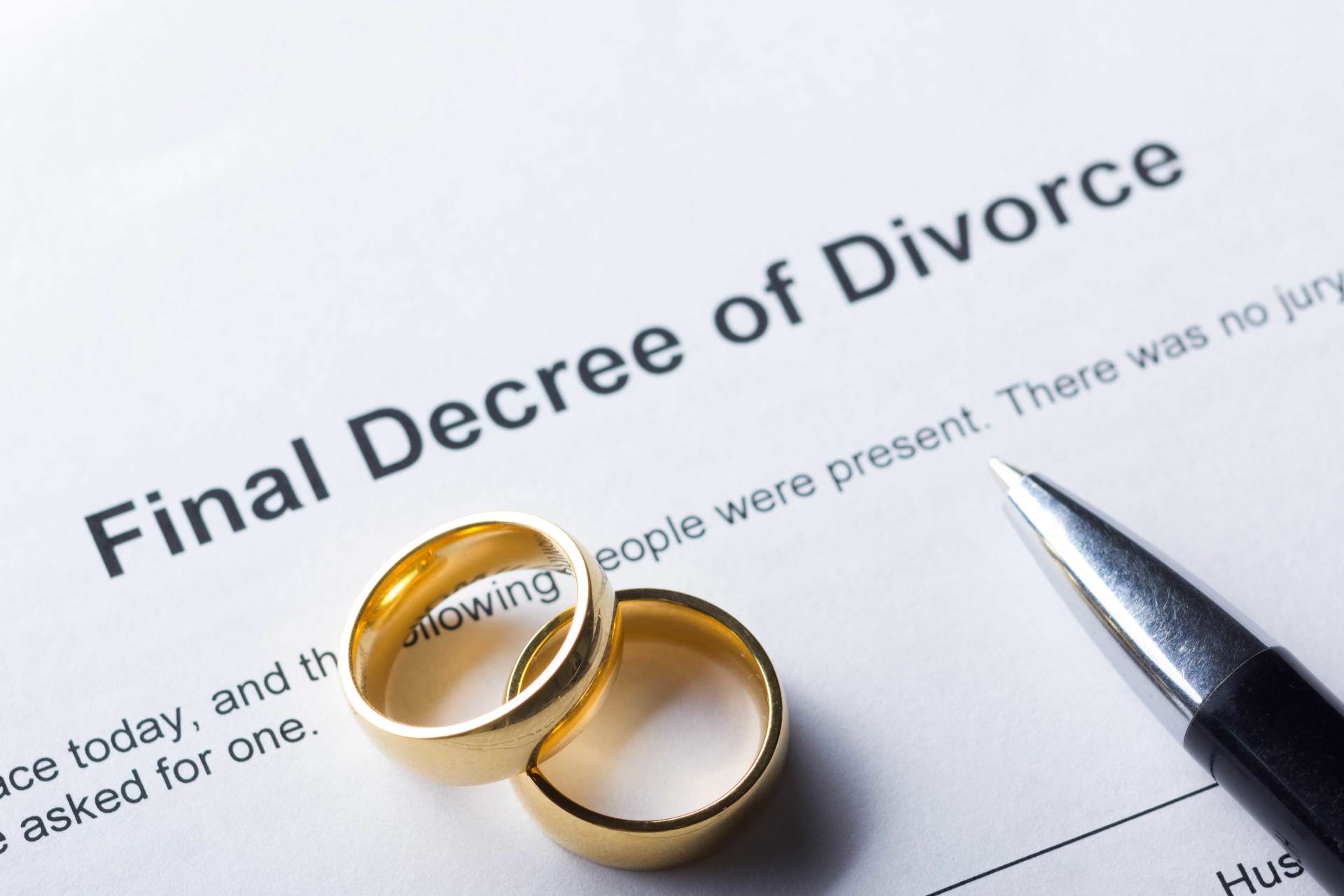 Divorce Decree Form with Wedding Rings — Mansfield, OH — Attorney Kristin Brown
