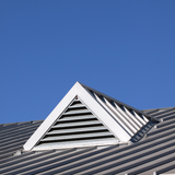 Michigan Wildlife Solutions - A roof with a triangle shaped vent on it