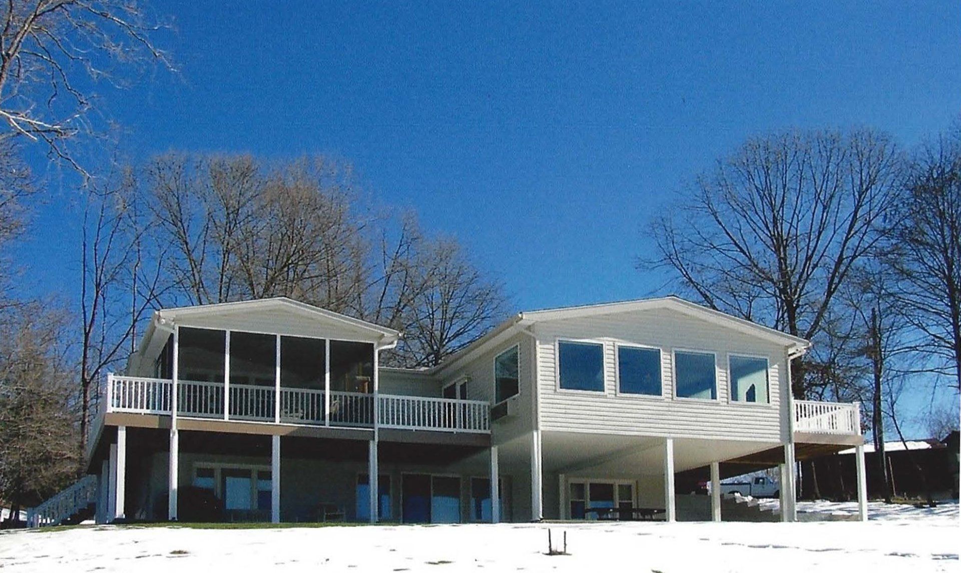 Large House Covered With Snow — Rocky Mount, VA — Lozeau Construction Inc