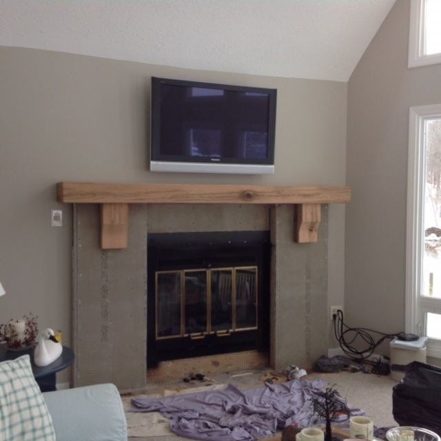 Fireplace Below TV on Wall — Rocky Mount, VA — Lozeau Construction Inc