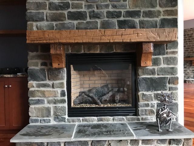 Fireplace With Chopped Woods — Rocky Mount, VA — Lozeau Construction Inc