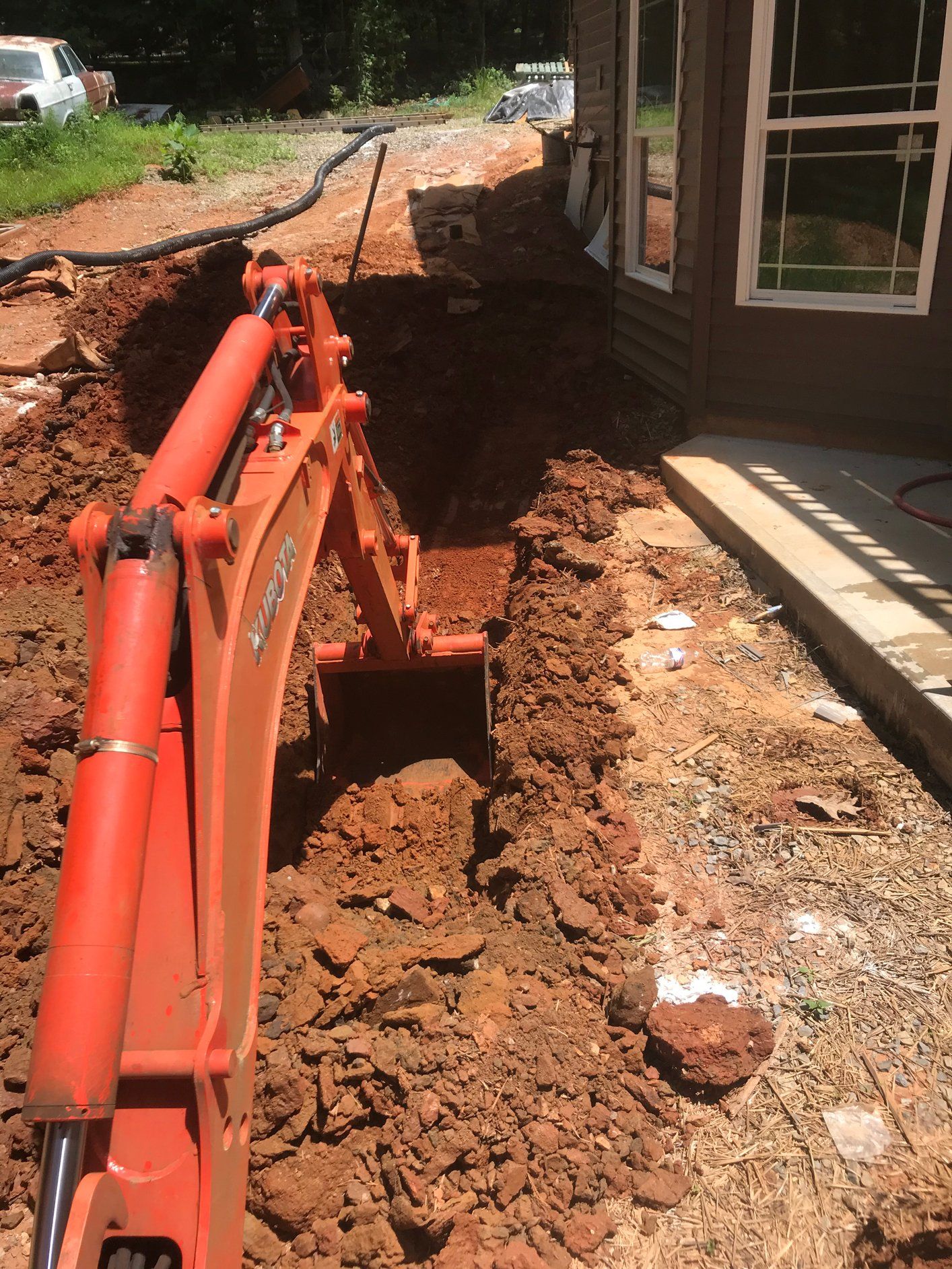 Truck Digging Hole — Rocky Mount, VA — Lozeau Construction Inc
