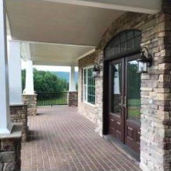 Home Exterior With Brick Wall — Rocky Mount, VA — Lozeau Construction Inc