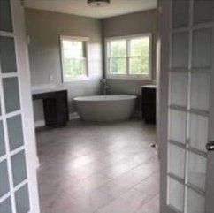 Bathtub Next To A Window — Rocky Mount, VA — Lozeau Construction Inc