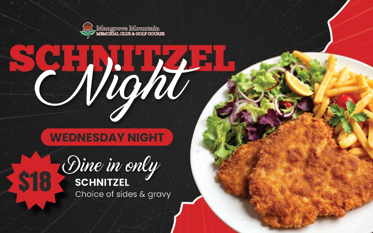 A plate of schnitzel with french fries and a salad