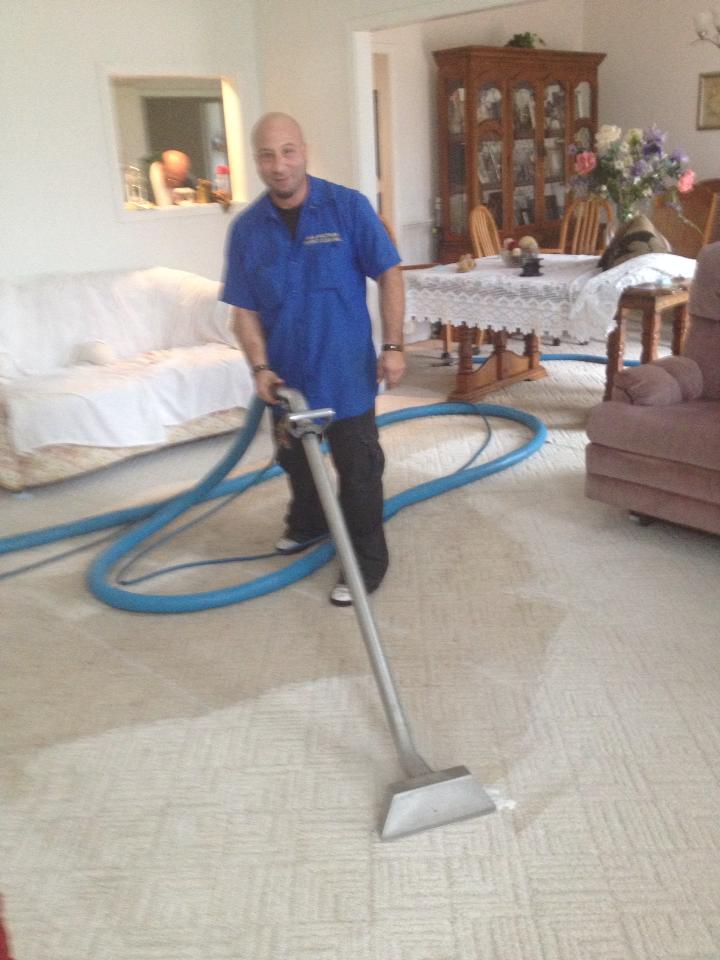 carpet cleaning specialist at work AAA Spectrum Carpet & Upholstery Cleaning Getzville NY