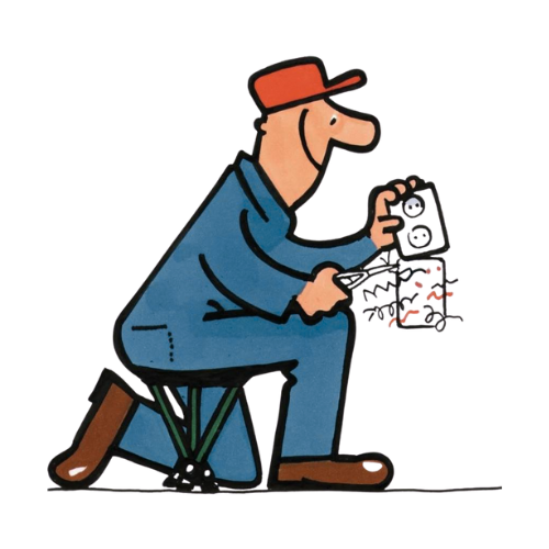Man in blue overalls and red hat, kneeling on a stool, cutting wires near an electrical outlet.