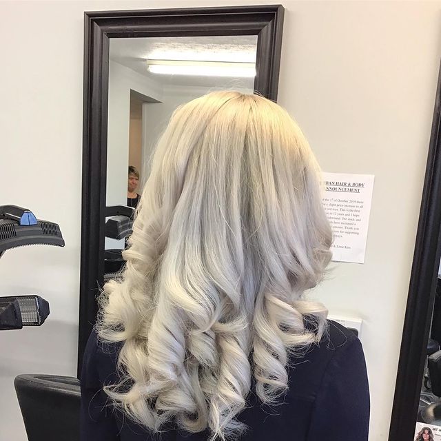curled blonde hair