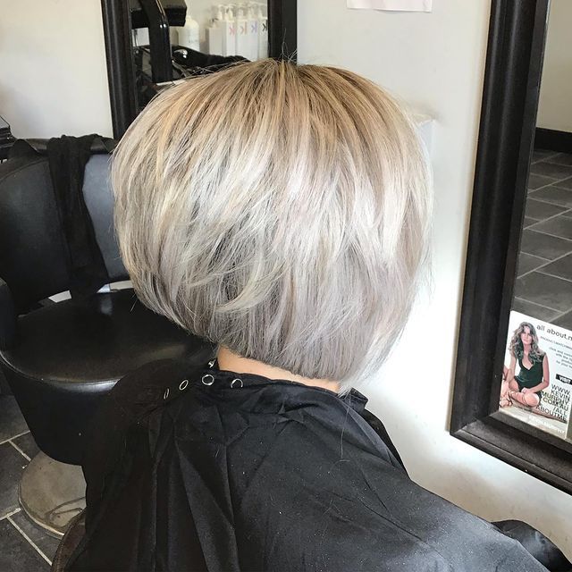 back of woman's head short brown hair