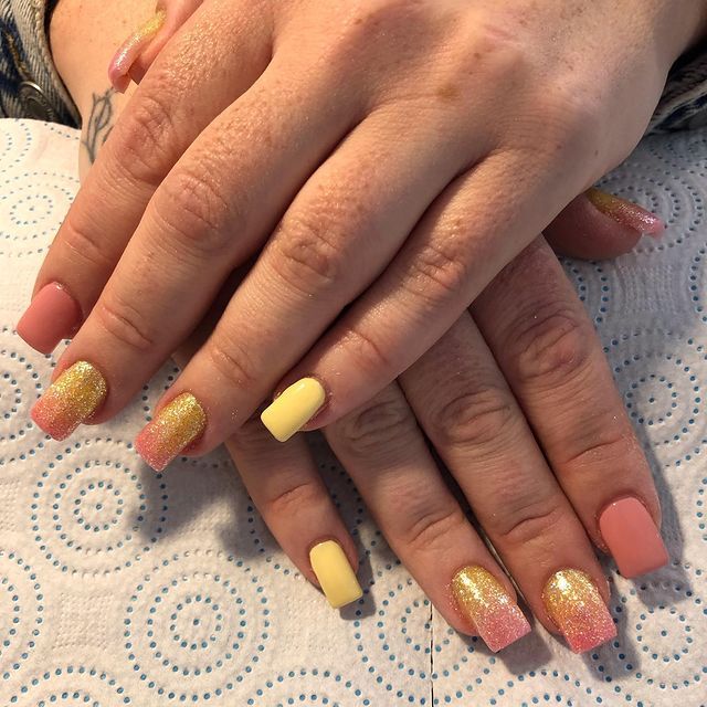 pink and yellow acrylic nails