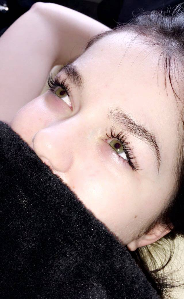 woman with green eyes and long lashes