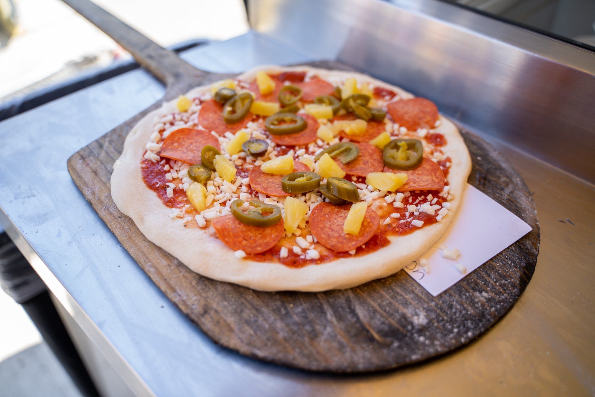 Dang Brother Pizza Camp Pendleton Cheese, Pepperoni, Pineapple, & Jalapeños Photo