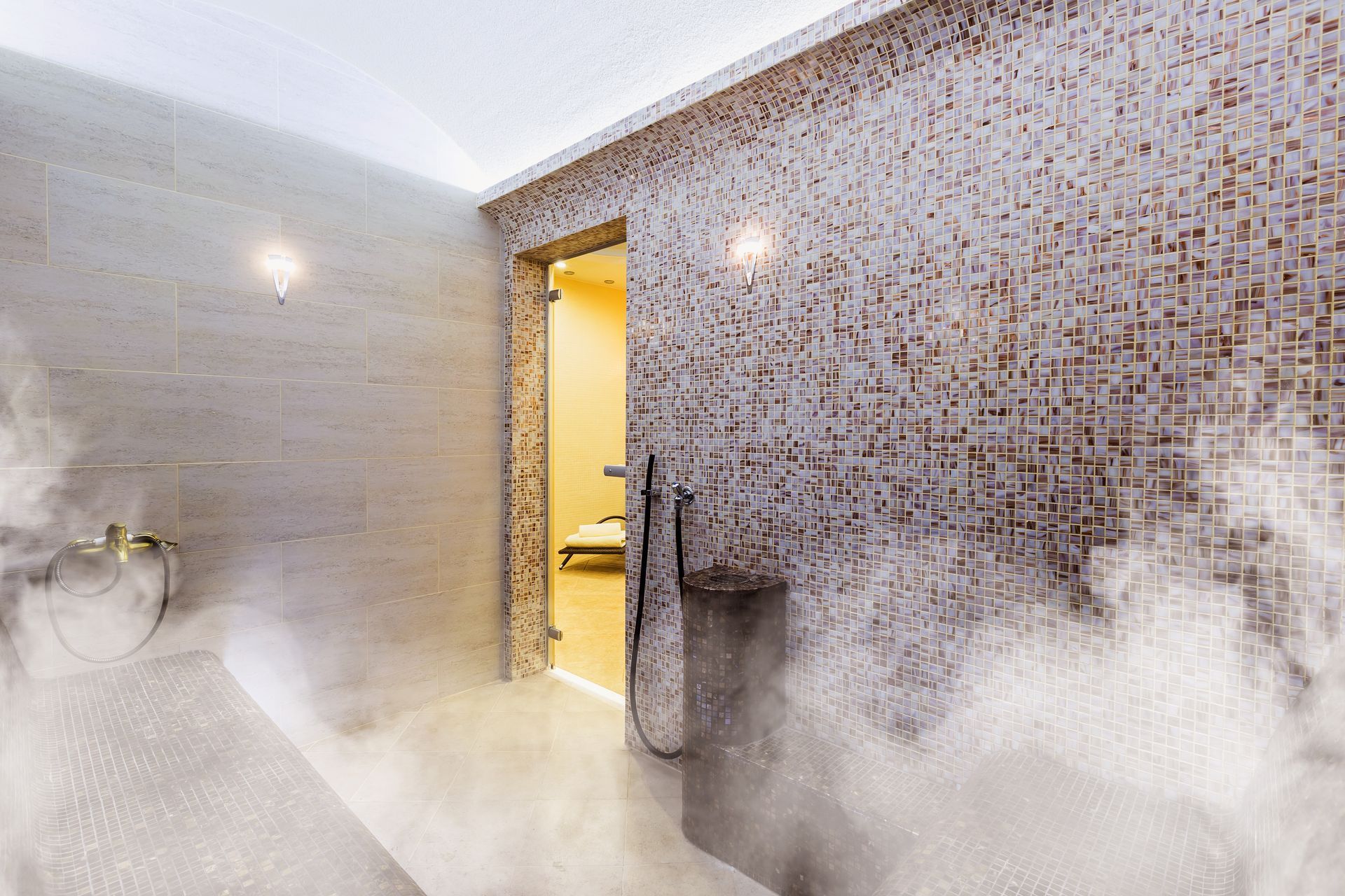 A steam room with smoke coming out of the door.