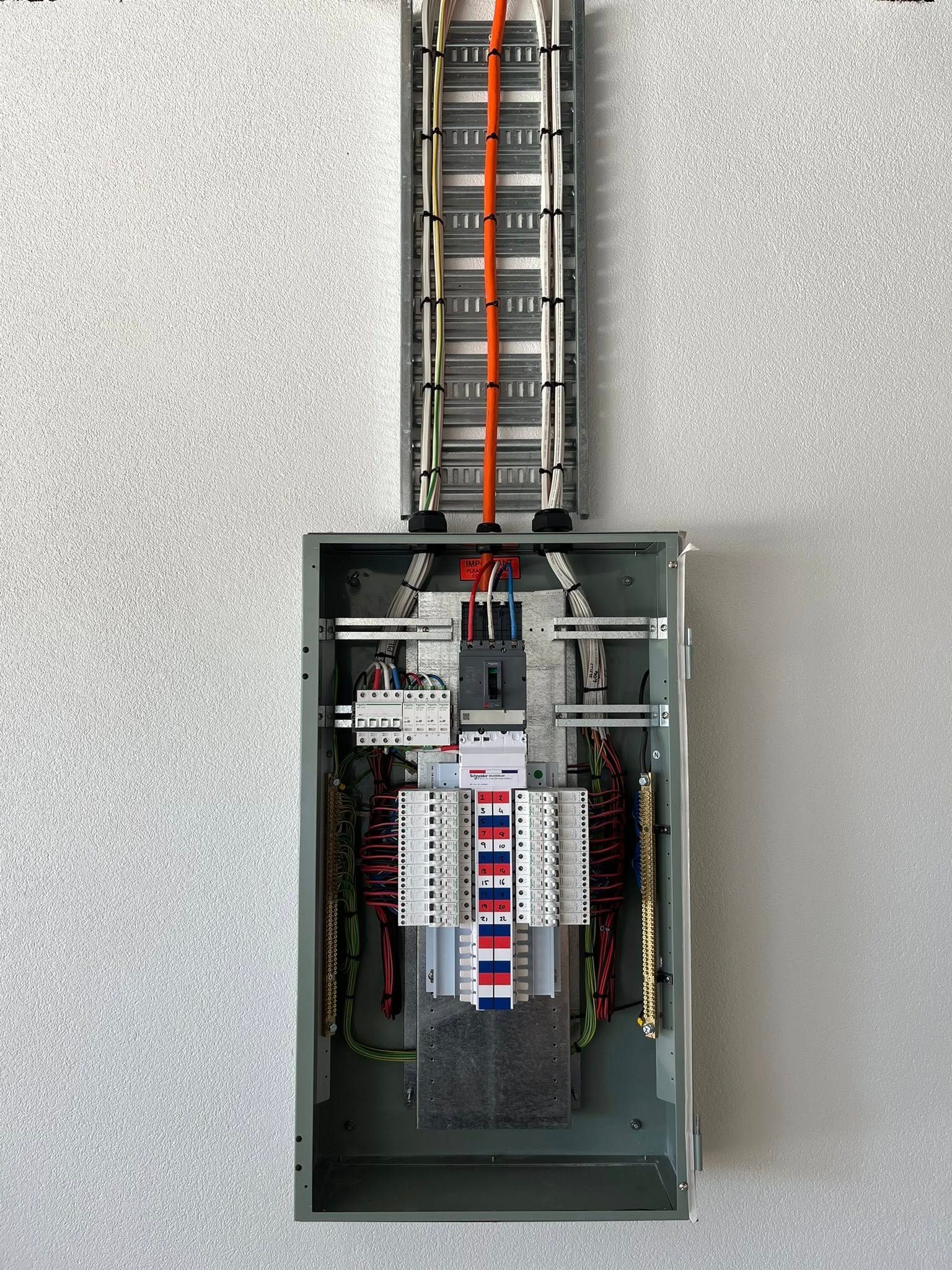 Electrical Panel With Exposed Wiring and Circuit Breakers — Topspark Electrical FNQ in Atherton, QLD