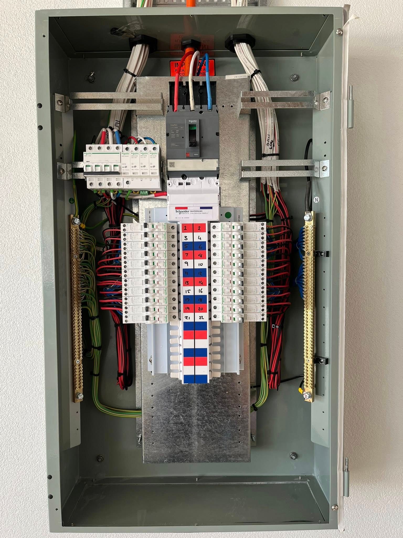 Open Electrical Control Panel With Wiring, and Breakers — Topspark Electrical FNQ in Bayview Heights, QLD
