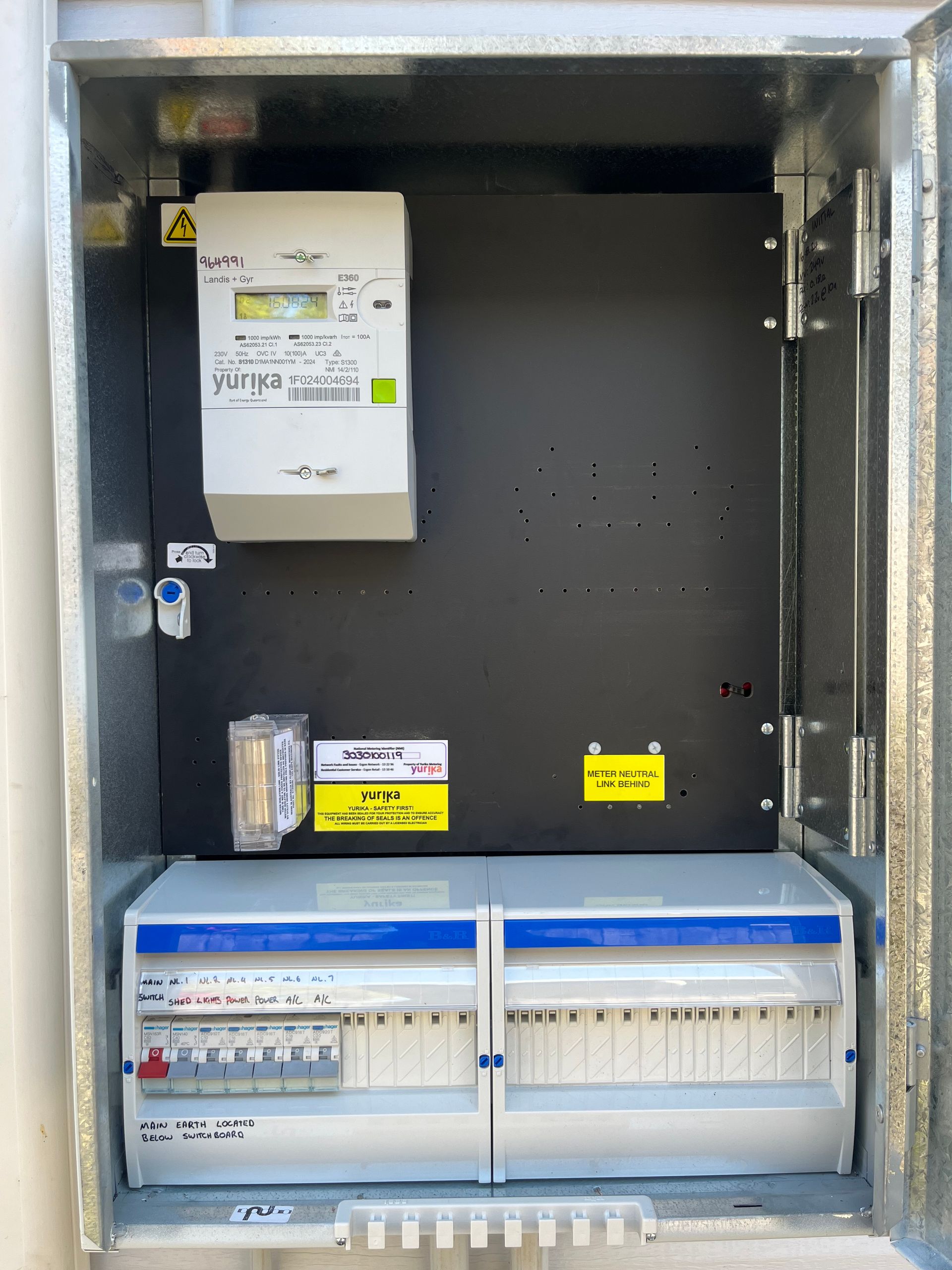 Open Electrical Panel Cabinet With Breakers — Topspark Electrical FNQ in Mission Beach, QLD