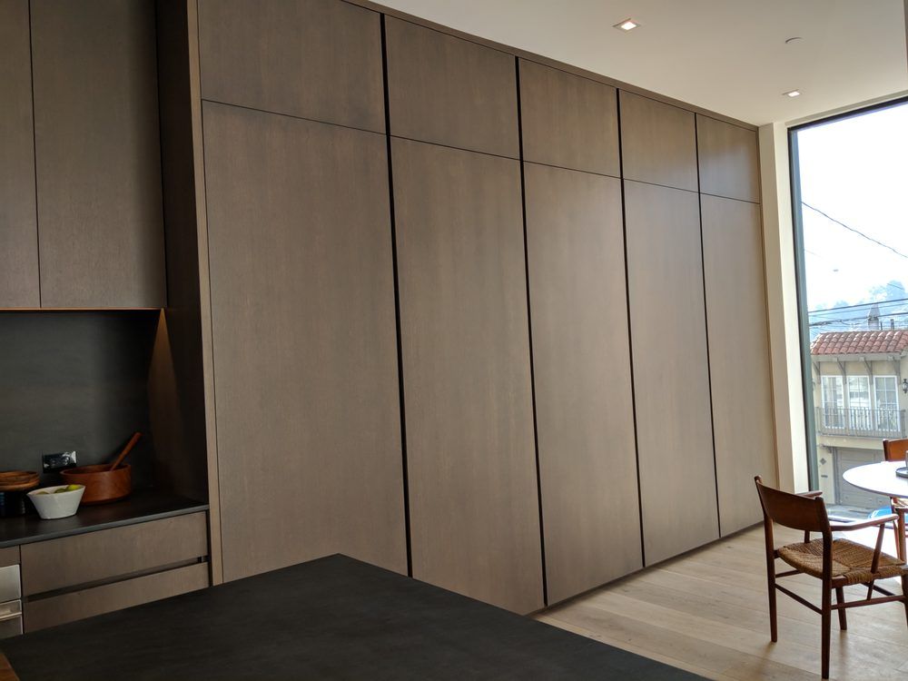 Smooth custom craft cabinets used in dining room.