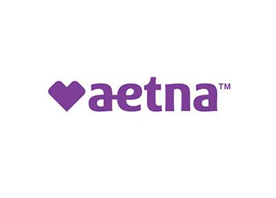 Purple Aetna logo with heart icon on white background