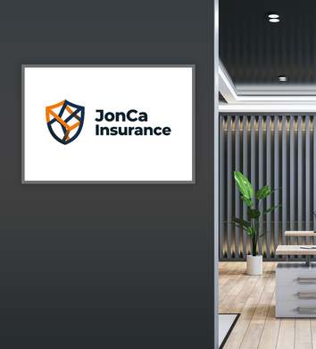 JonCa Insurance logo on a wall sign in a modern office lobby