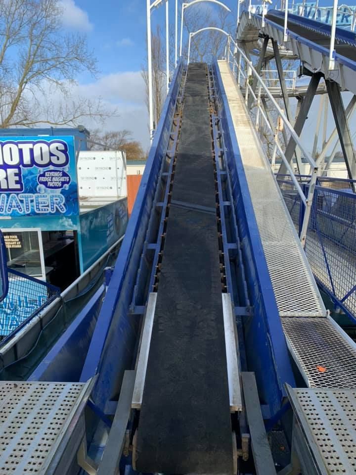 A Roller Coaster Is Going Down a Roller Coaster Track — Conveyor Maintenance Services In Ingham, QLD