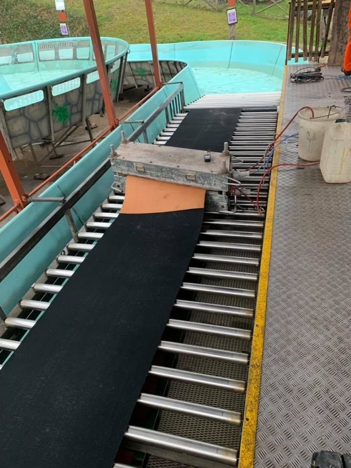 Repairing The Conveyor Belts Using The Machine — Conveyor Maintenance Services In Mount Isa, QLD