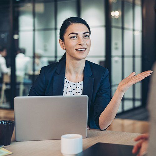 Business Woman Talking With Client — Chicago, IL — Mail Center Of Chicago Inc
