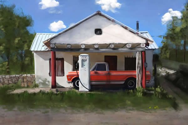 A red truck is parked in front of a white house.