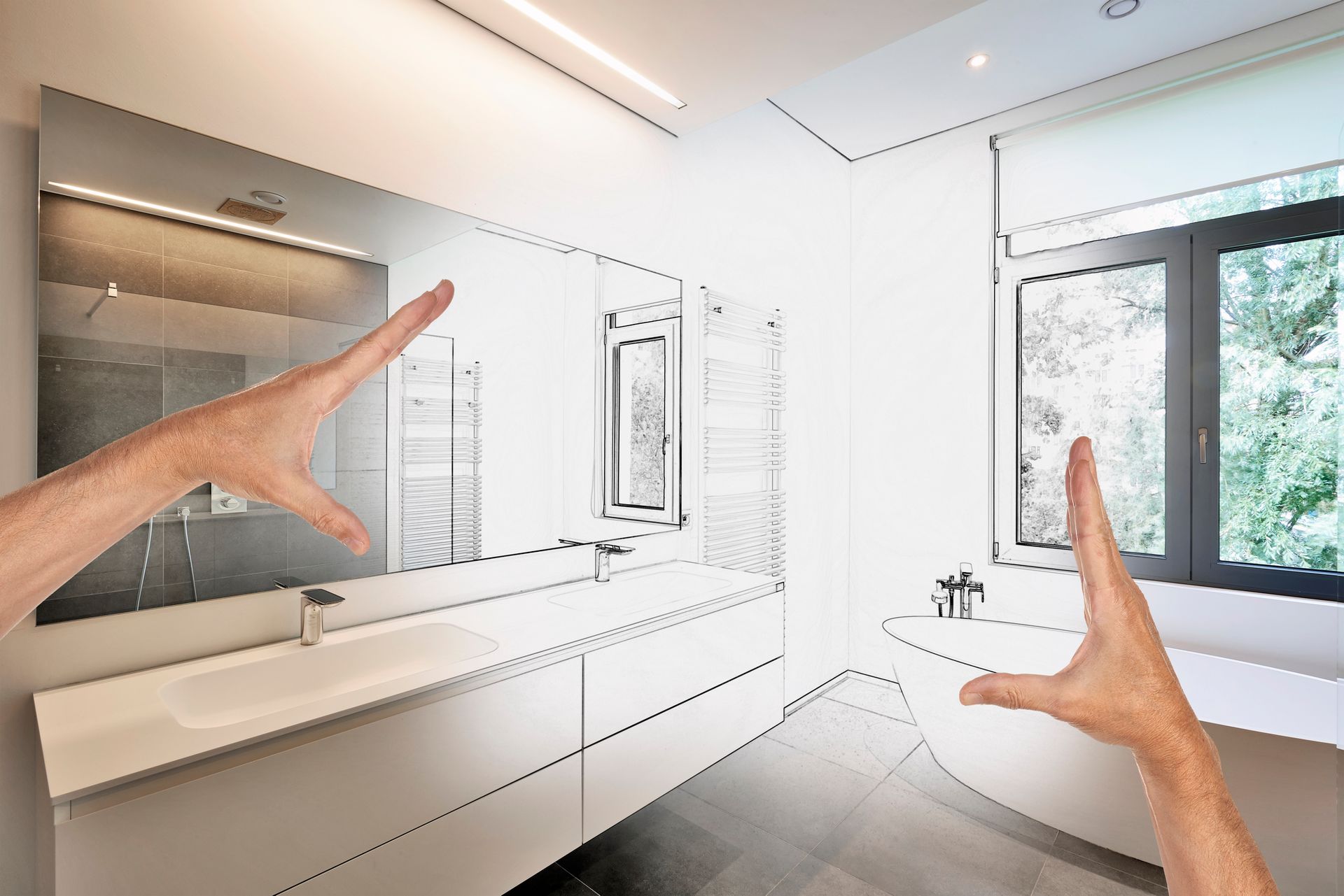 Modern bathroom renovation concept with sketch overlay and hands framing design plan.
