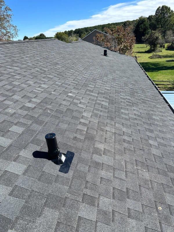 A roof with a chimney on top of it