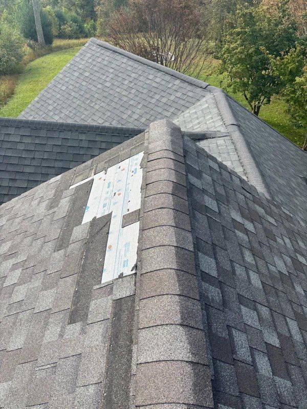A close up of a roof with a hole in it.