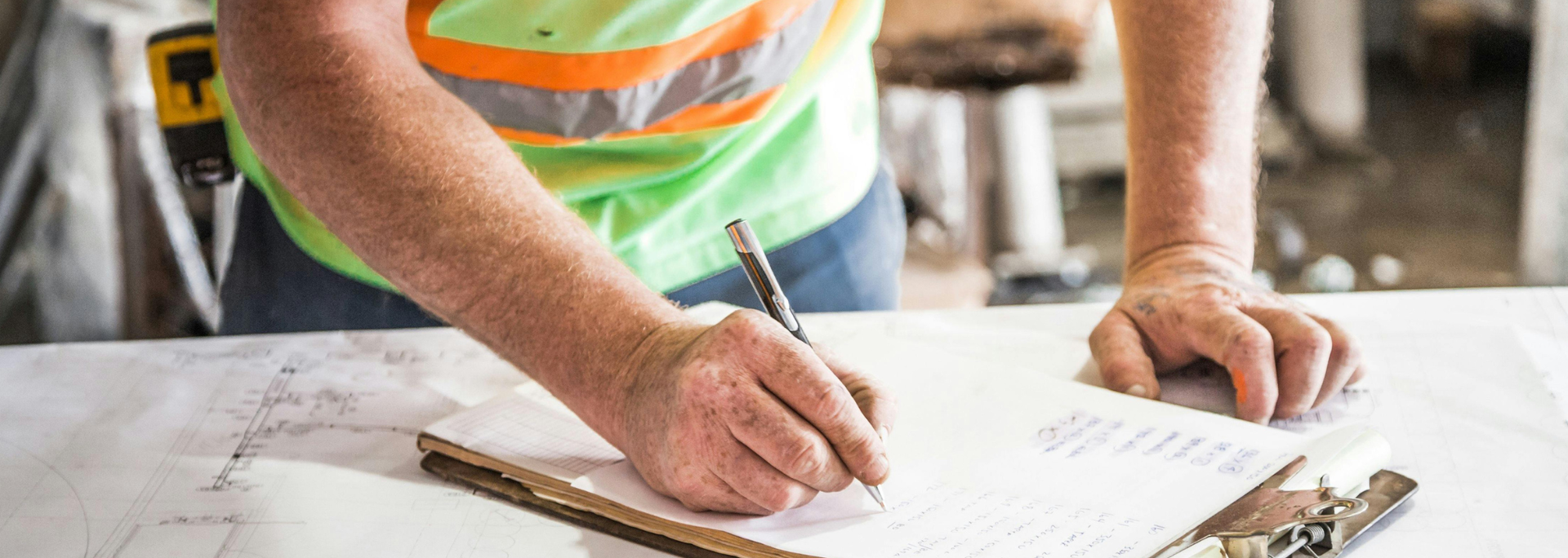 Picture of someone planning out something. Picture of someone planning out something.
