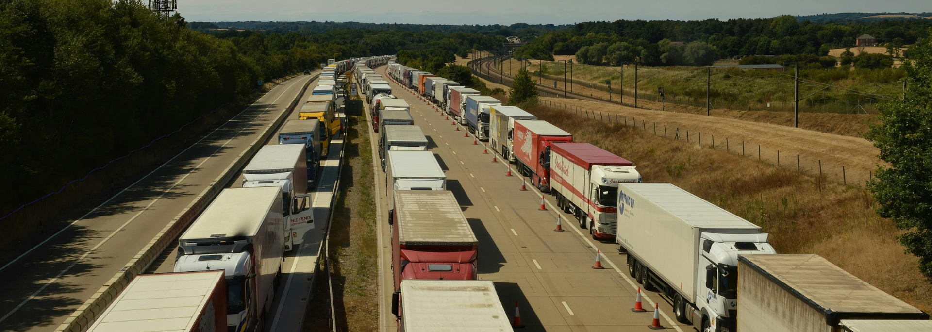 Highway traffic jam of semi-trucks.