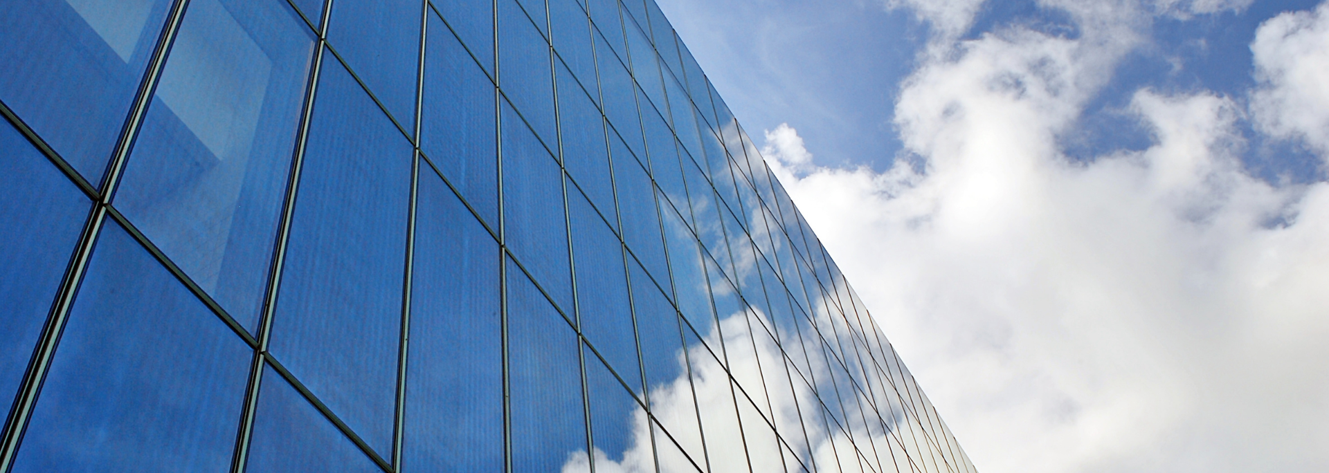 Picture of a glass facade. Picture of a glass facade.