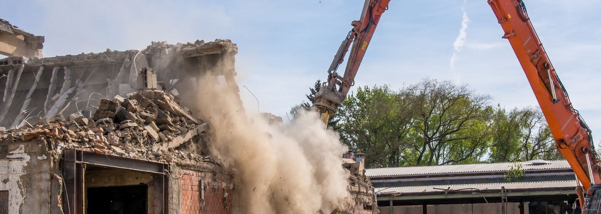 Picture of a building being demolished. 