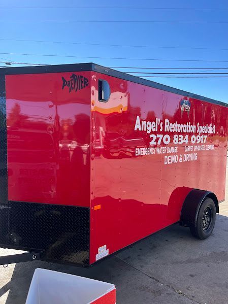 A red trailer with the number 270 834 0917 on it