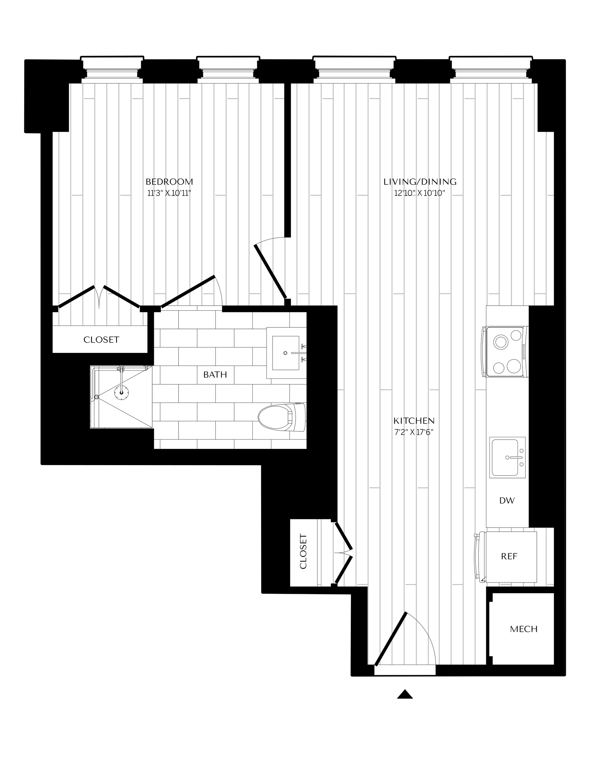 Floor plan of a studio apartment. It includes a bathroom, kitchen, living area, and bedroom section.