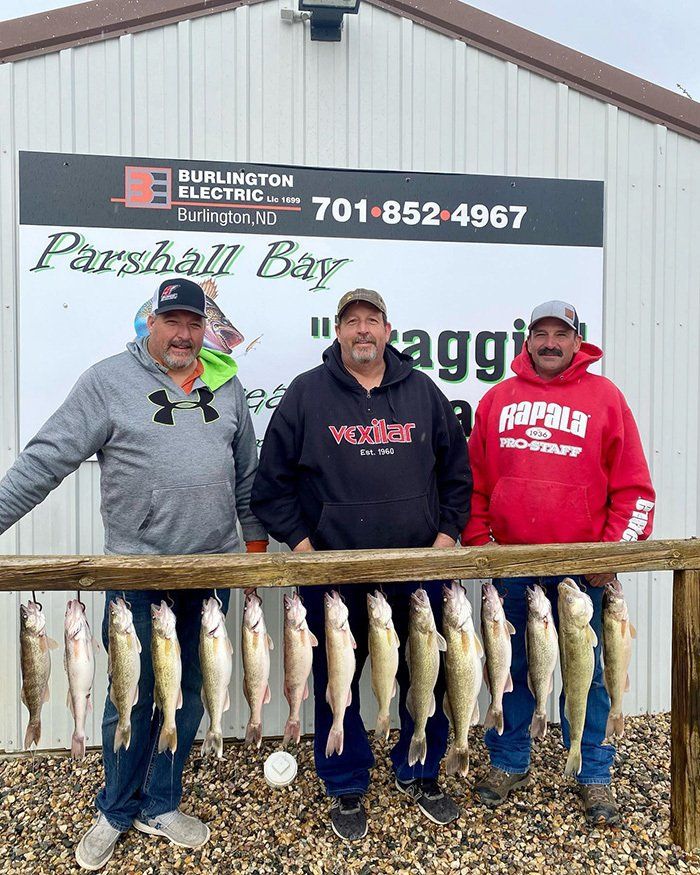 fishermen and their catches of the day