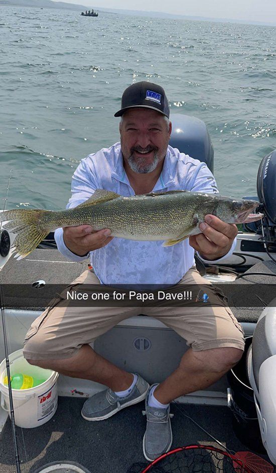 man with his fresh caught fish