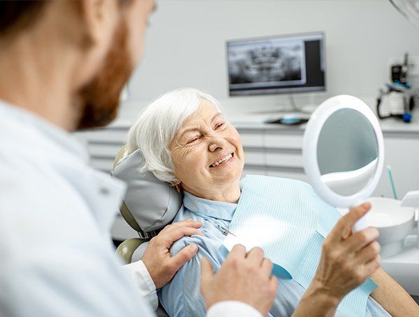 Senior Woman is Happy at Dental Visit — Richmond, VA — Dr. Babik & Associates