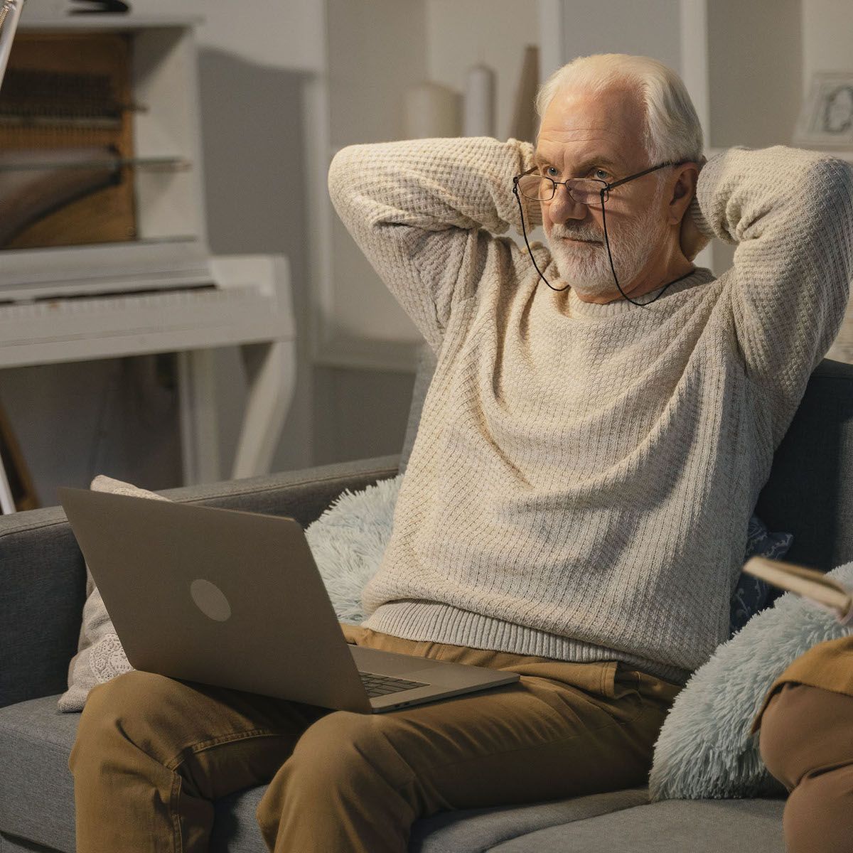 Man with laptop afraid to email key contact in a company