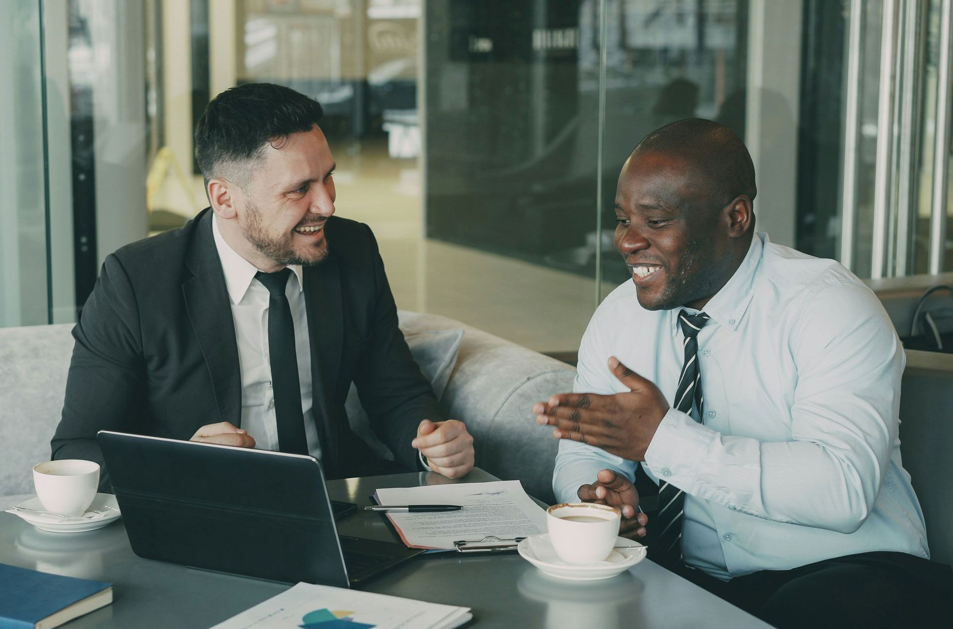 executive career coach meeting with client and reviewing networking opportunities