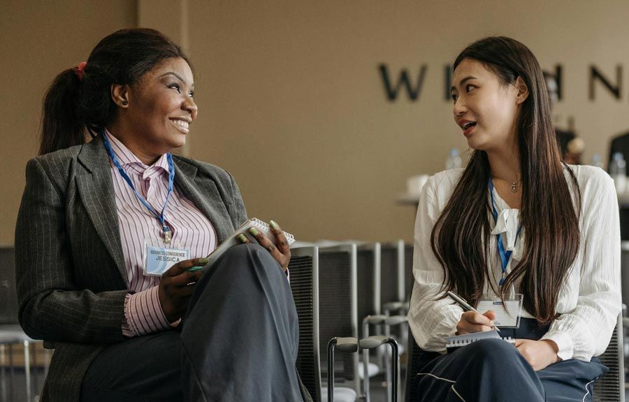 an executive job seeker asking a vendor salesperson about hidden job opportunities in their industry