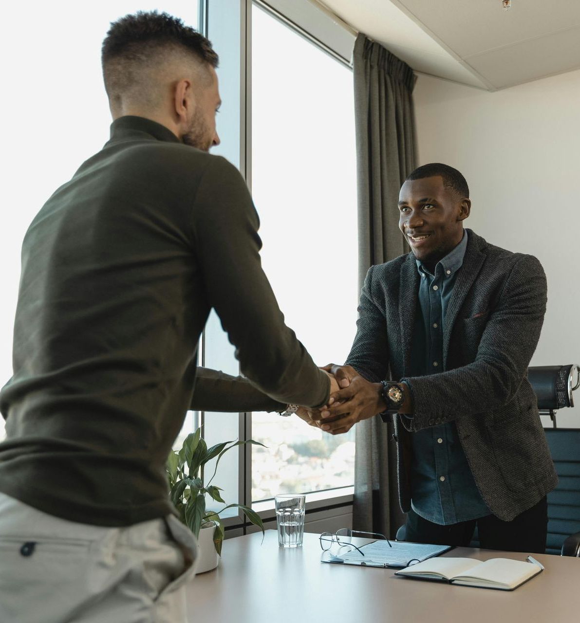 Hiring manager meeting prospective employee in the interview phase of a job search.